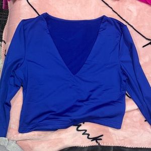 Blue body icon, crop top, long sleeve size extra-large. Runs small.